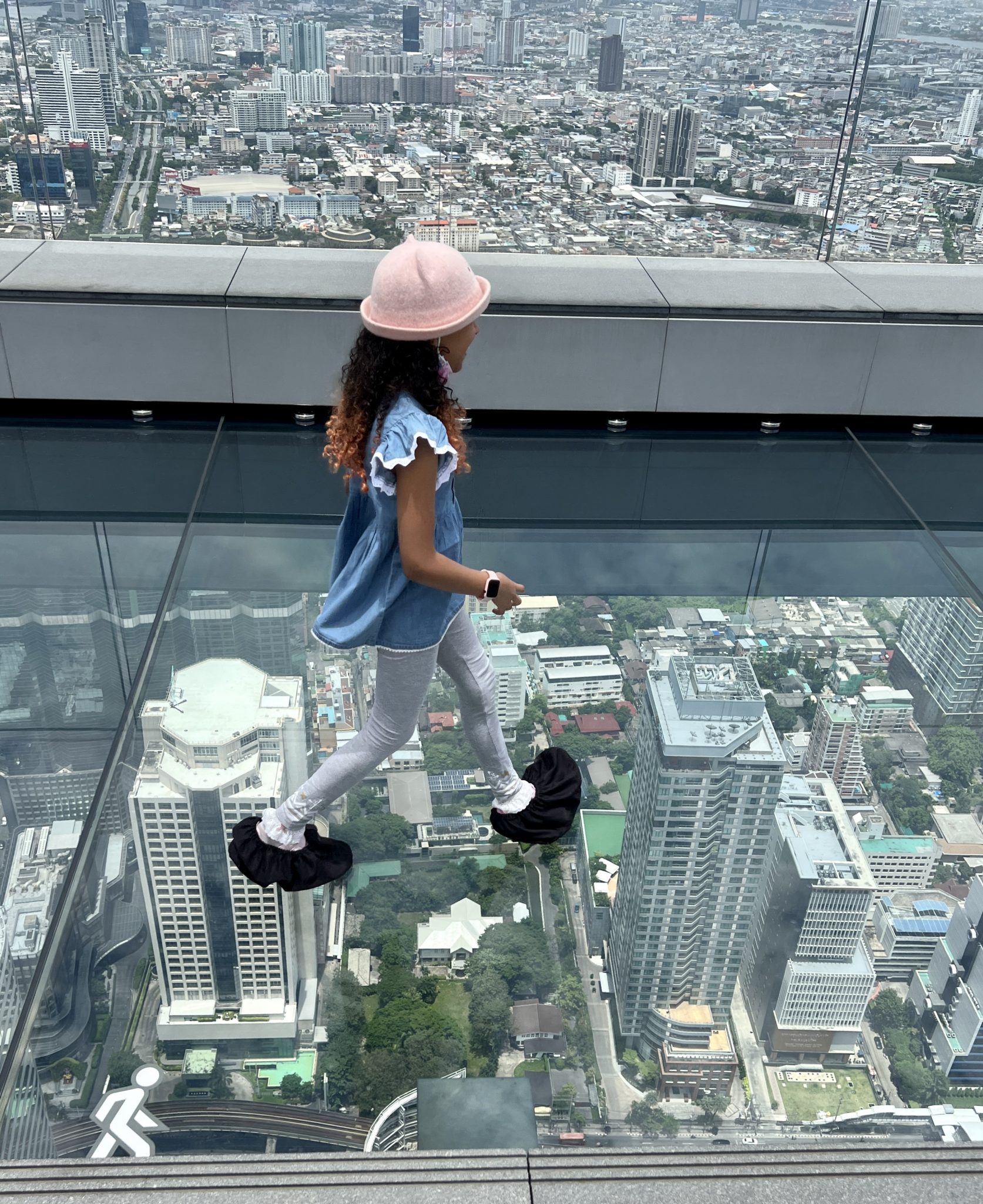 Kids enjoying the Mahanakhon Sky Walk