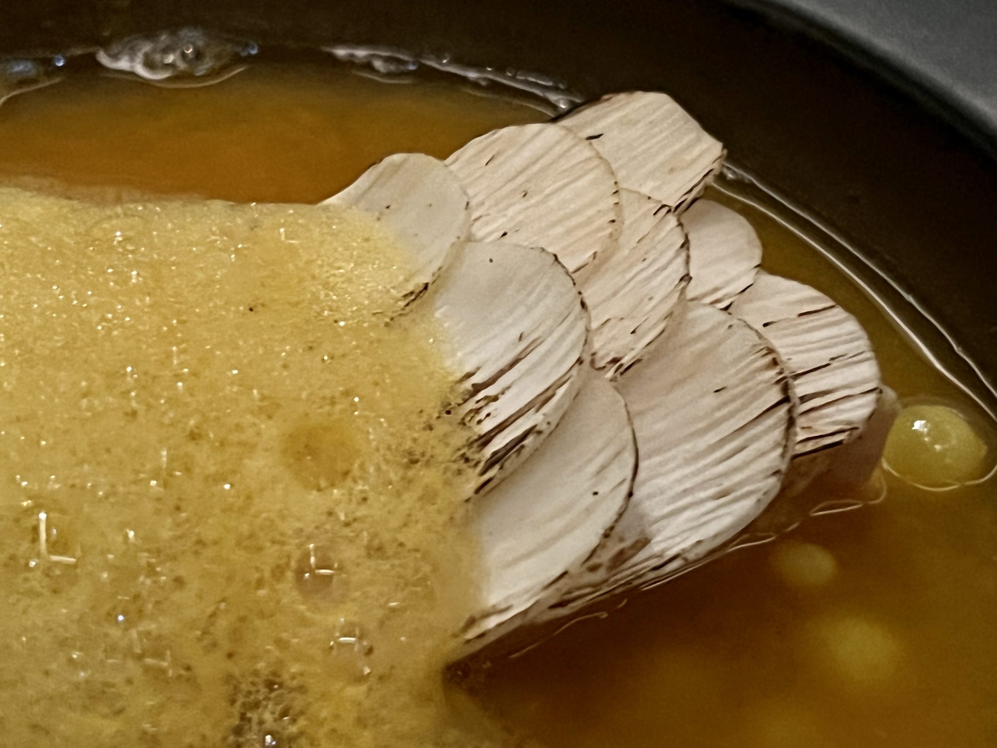 Jaras: Coconut shoot, shallot pearl with Gaeng Som Soup
